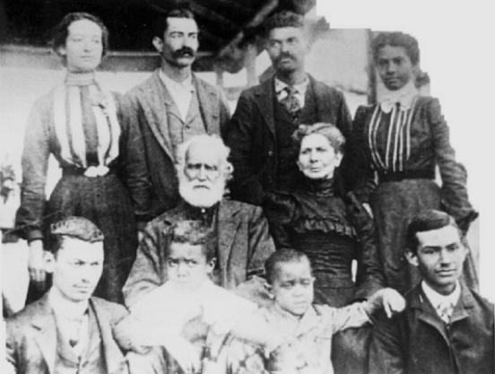 I do not have any photos of Varnell Mayo, his siblings, or parents. Varnell's first cousin Julia Chavis (1845-1939) is the elder woman seated in the middle. She was the daughter of William Chavis and Delilah Guy. William Chavis was Varnell's uncle and the man who provided the bond for the marriage of Varnell's parents William Mayo and Joyce Chavis. Julia is pictured here with her husband William Solomon Bibby, children, and grandchildren at the family farm in Franklinton, NC in 1898. (My great-grandfather Edward Brodie Howell's first wife Mary Bibby is standing on the right).